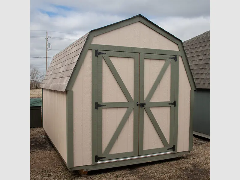 A shed with two doors and a roof.