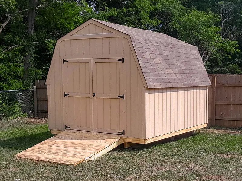 A shed with a ramp on the side of it.