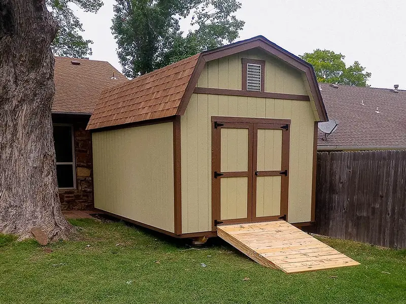 A shed with a ramp in the middle of it.