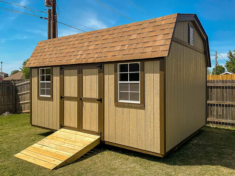 A small shed with a ramp in the front.