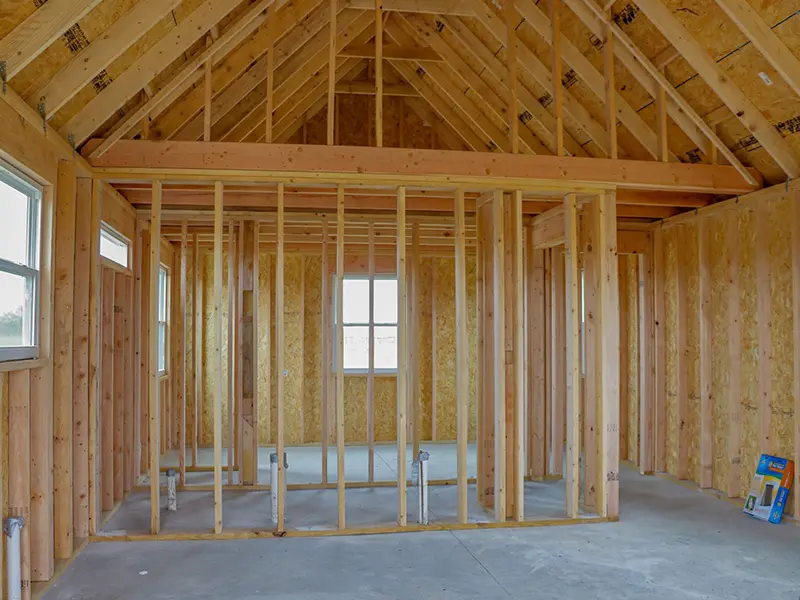 A room with some wood framing in it