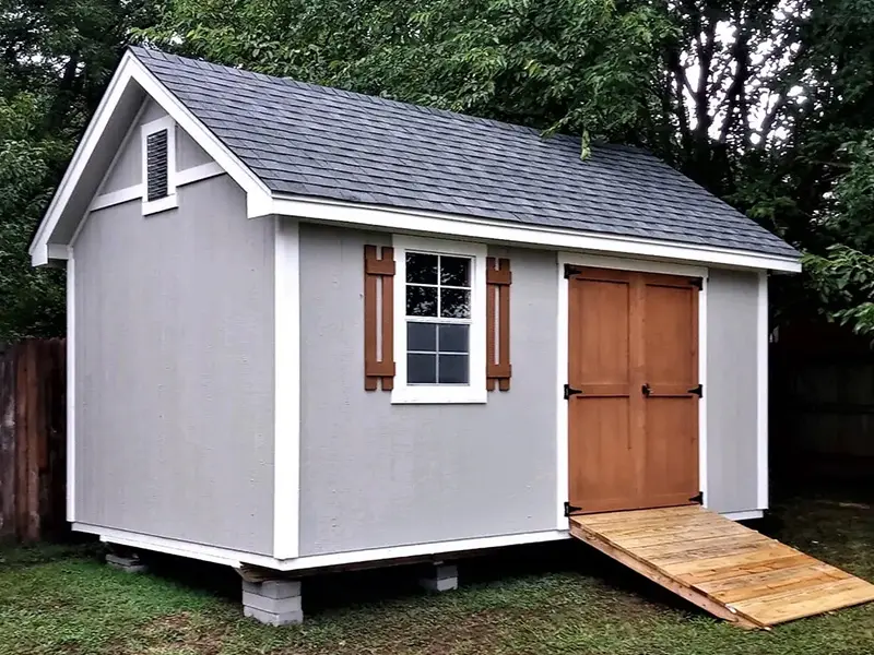 A shed with a ramp on the side of it.